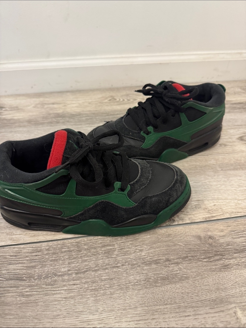 Jordan Flight Kids Black and Green Low-Top Sneakers with Red Tongue Accent